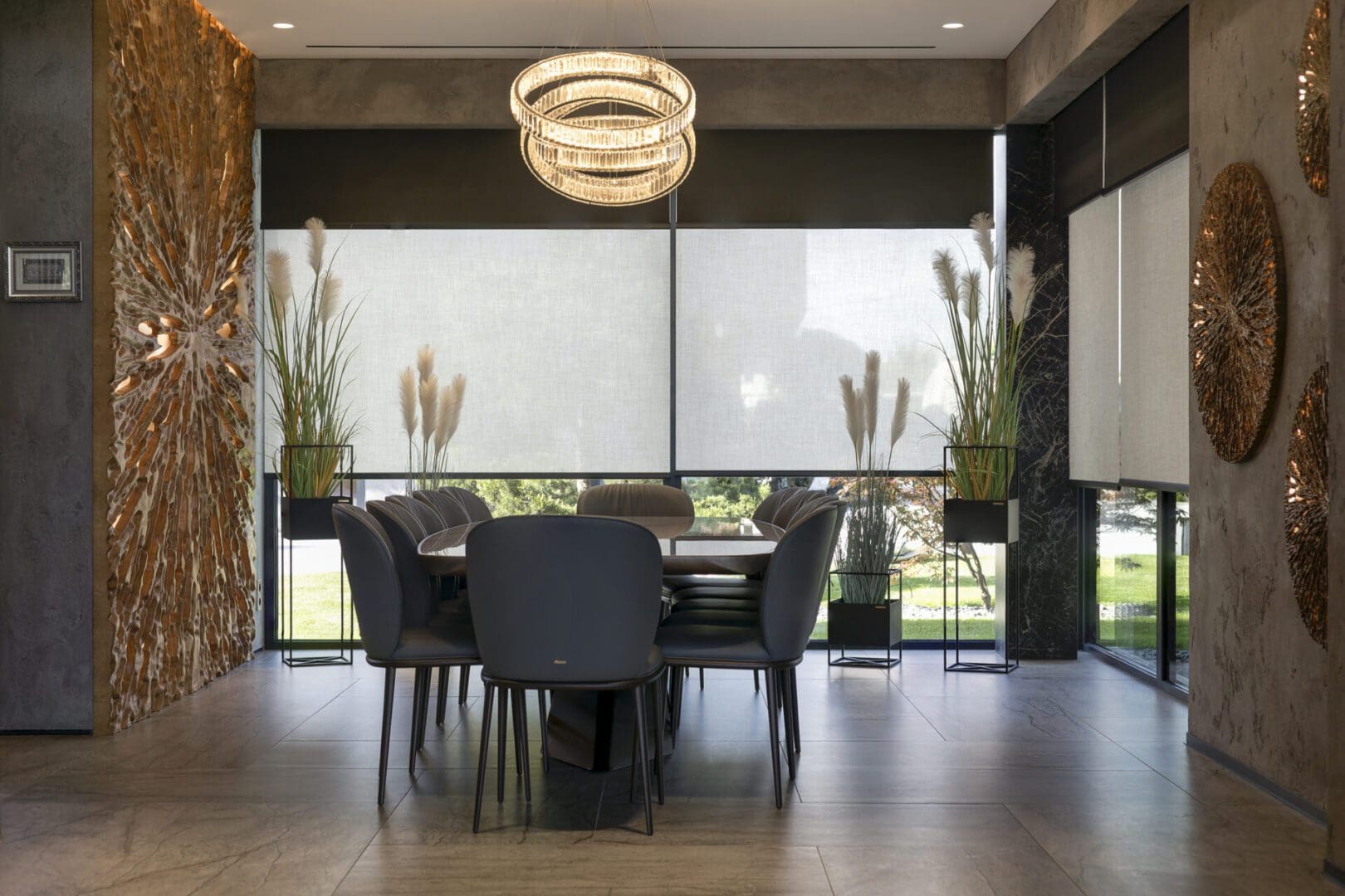 Contemporary dining room with round chandelier